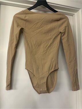Free People Long Sleeve One-Piece Bodysuit in Beige